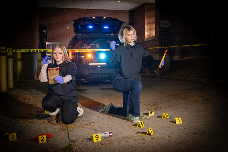 Image of public safety students gathering evidence.